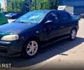 Черный Опель Астра, объемом двигателя 1.4 л и пробегом 300 тыс. км за 1800 $, фото 1 на Automoto.ua