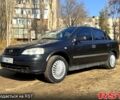 Черный Опель Астра, объемом двигателя 1.4 л и пробегом 211 тыс. км за 3650 $, фото 1 на Automoto.ua