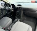 Черный Опель Астра, объемом двигателя 1.4 л и пробегом 200 тыс. км за 3800 $, фото 22 на Automoto.ua
