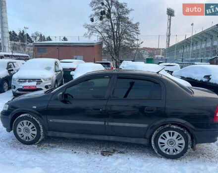 Черный Опель Астра, объемом двигателя 1.36 л и пробегом 170 тыс. км за 4300 $, фото 3 на Automoto.ua