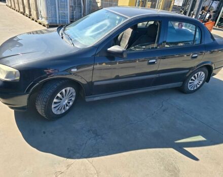 Черный Опель Астра, объемом двигателя 1.4 л и пробегом 240 тыс. км за 3000 $, фото 1 на Automoto.ua