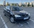 Черный Опель Астра, объемом двигателя 1.4 л и пробегом 210 тыс. км за 3597 $, фото 1 на Automoto.ua