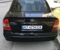 Черный Опель Астра, объемом двигателя 1.4 л и пробегом 187 тыс. км за 3800 $, фото 2 на Automoto.ua