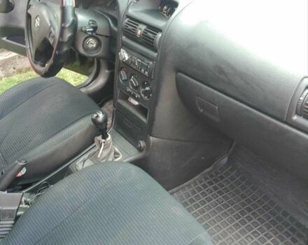 Черный Опель Астра, объемом двигателя 1.4 л и пробегом 243 тыс. км за 3200 $, фото 3 на Automoto.ua