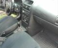 Черный Опель Астра, объемом двигателя 1.4 л и пробегом 243 тыс. км за 3200 $, фото 3 на Automoto.ua