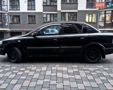 Черный Опель Астра, объемом двигателя 1.39 л и пробегом 214 тыс. км за 1800 $, фото 21 на Automoto.ua