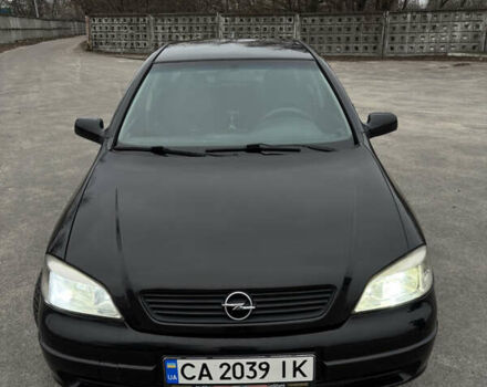 Черный Опель Астра, объемом двигателя 2 л и пробегом 300 тыс. км за 3800 $, фото 1 на Automoto.ua