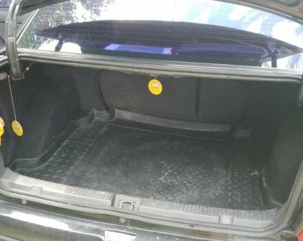 Черный Опель Астра, объемом двигателя 1.4 л и пробегом 243 тыс. км за 3200 $, фото 1 на Automoto.ua