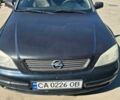 Черный Опель Астра, объемом двигателя 1.4 л и пробегом 240 тыс. км за 3000 $, фото 1 на Automoto.ua