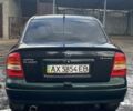 Черный Опель Астра, объемом двигателя 1.4 л и пробегом 380 тыс. км за 3200 $, фото 3 на Automoto.ua
