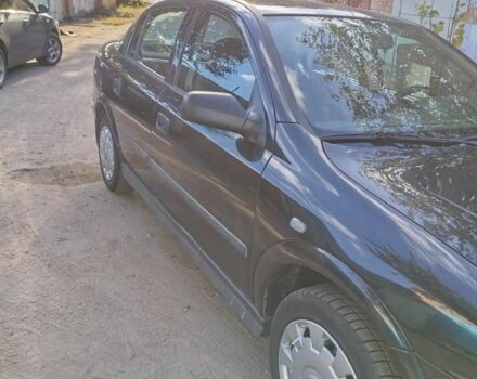 Черный Опель Астра, объемом двигателя 1.4 л и пробегом 136 тыс. км за 3900 $, фото 2 на Automoto.ua