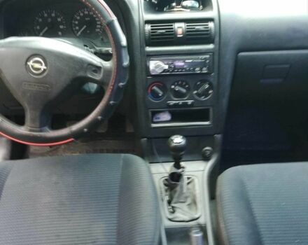 Черный Опель Астра, объемом двигателя 1.4 л и пробегом 243 тыс. км за 3200 $, фото 5 на Automoto.ua
