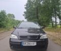 Черный Опель Астра, объемом двигателя 1.4 л и пробегом 185 тыс. км за 4653 $, фото 1 на Automoto.ua