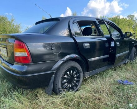 Черный Опель Астра, объемом двигателя 1.4 л и пробегом 294 тыс. км за 3800 $, фото 7 на Automoto.ua