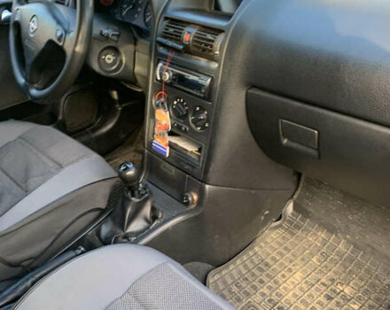 Черный Опель Астра, объемом двигателя 1.4 л и пробегом 216 тыс. км за 3500 $, фото 5 на Automoto.ua