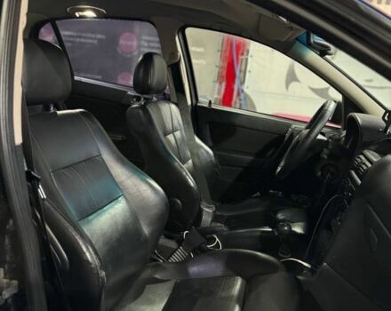 Черный Опель Астра, объемом двигателя 1.4 л и пробегом 215 тыс. км за 3500 $, фото 8 на Automoto.ua