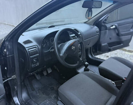 Черный Опель Астра, объемом двигателя 1.36 л и пробегом 260 тыс. км за 2900 $, фото 10 на Automoto.ua