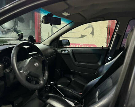 Черный Опель Астра, объемом двигателя 1.36 л и пробегом 215 тыс. км за 3900 $, фото 21 на Automoto.ua
