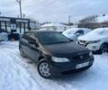 Черный Опель Астра, объемом двигателя 1.4 л и пробегом 233 тыс. км за 4300 $, фото 1 на Automoto.ua