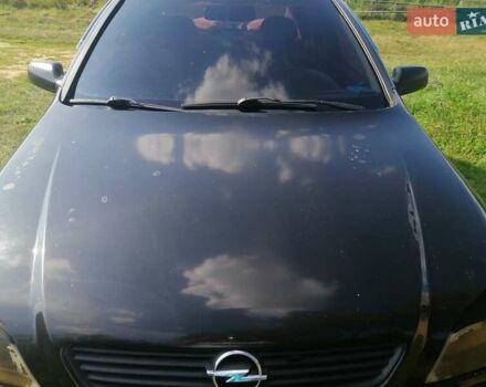 Черный Опель Астра, объемом двигателя 1.4 л и пробегом 250 тыс. км за 3000 $, фото 2 на Automoto.ua