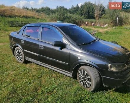 Черный Опель Астра, объемом двигателя 1.4 л и пробегом 250 тыс. км за 3000 $, фото 9 на Automoto.ua