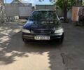 Черный Опель Астра, объемом двигателя 1.4 л и пробегом 199 тыс. км за 3572 $, фото 1 на Automoto.ua