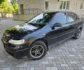 Черный Опель Астра, объемом двигателя 1.4 л и пробегом 159 тыс. км за 4999 $, фото 1 на Automoto.ua
