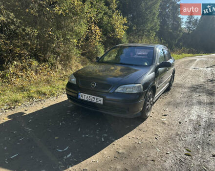 Черный Опель Астра, объемом двигателя 1.4 л и пробегом 230 тыс. км за 2100 $, фото 1 на Automoto.ua
