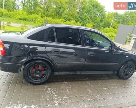 Черный Опель Астра, объемом двигателя 1.6 л и пробегом 147 тыс. км за 2700 $, фото 25 на Automoto.ua