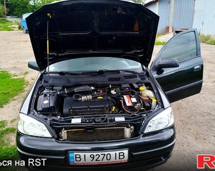Черный Опель Астра, объемом двигателя 1.6 л и пробегом 217 тыс. км за 4100 $, фото 10 на Automoto.ua