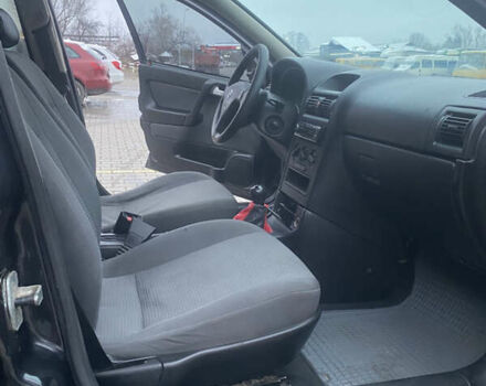 Черный Опель Астра, объемом двигателя 1.4 л и пробегом 229 тыс. км за 3200 $, фото 12 на Automoto.ua