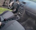 Черный Опель Астра, объемом двигателя 1.4 л и пробегом 140 тыс. км за 3300 $, фото 5 на Automoto.ua