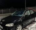 Черный Опель Астра, объемом двигателя 1.4 л и пробегом 338 тыс. км за 2300 $, фото 1 на Automoto.ua