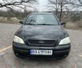 Черный Опель Астра, объемом двигателя 1.6 л и пробегом 247 тыс. км за 4400 $, фото 1 на Automoto.ua