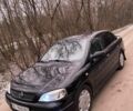 Черный Опель Астра, объемом двигателя 0 л и пробегом 160 тыс. км за 3500 $, фото 1 на Automoto.ua