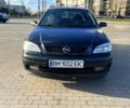 Черный Опель Астра, объемом двигателя 1.4 л и пробегом 176 тыс. км за 4000 $, фото 3 на Automoto.ua