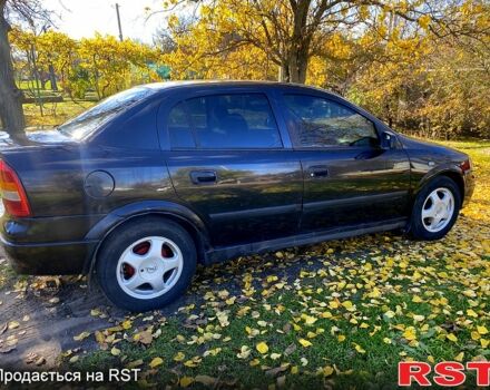 Черный Опель Астра, объемом двигателя 1.4 л и пробегом 168 тыс. км за 2450 $, фото 7 на Automoto.ua