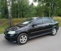 Черный Опель Астра, объемом двигателя 1.6 л и пробегом 300 тыс. км за 4000 $, фото 1 на Automoto.ua