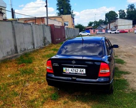 Черный Опель Астра, объемом двигателя 1.4 л и пробегом 141 тыс. км за 4000 $, фото 1 на Automoto.ua