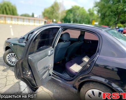 Черный Опель Астра, объемом двигателя 1.4 л и пробегом 320 тыс. км за 3300 $, фото 4 на Automoto.ua