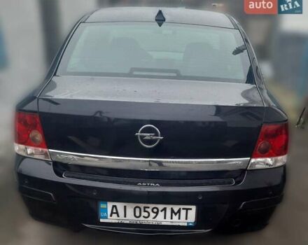 Черный Опель Астра, объемом двигателя 1.6 л и пробегом 180 тыс. км за 3800 $, фото 2 на Automoto.ua