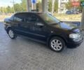 Черный Опель Астра, объемом двигателя 1.4 л и пробегом 107 тыс. км за 4800 $, фото 3 на Automoto.ua