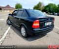 Черный Опель Астра, объемом двигателя 1.4 л и пробегом 320 тыс. км за 3300 $, фото 1 на Automoto.ua