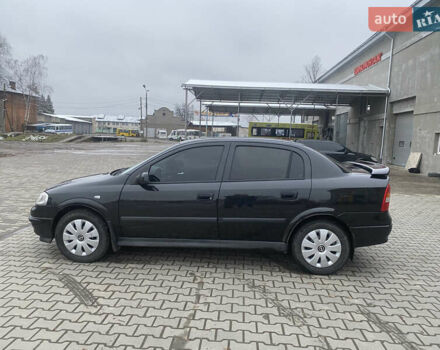 Черный Опель Астра, объемом двигателя 1.4 л и пробегом 229 тыс. км за 3200 $, фото 7 на Automoto.ua