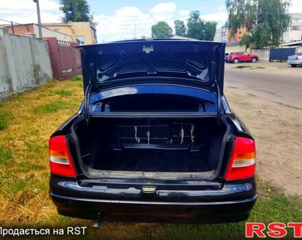 Черный Опель Астра, объемом двигателя 1.4 л и пробегом 141 тыс. км за 4000 $, фото 3 на Automoto.ua