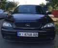 Черный Опель Астра, объемом двигателя 1.6 л и пробегом 170 тыс. км за 3900 $, фото 1 на Automoto.ua