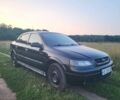 Черный Опель Астра, объемом двигателя 1.4 л и пробегом 140 тыс. км за 3300 $, фото 2 на Automoto.ua
