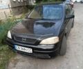 Черный Опель Астра, объемом двигателя 1.4 л и пробегом 250 тыс. км за 3608 $, фото 1 на Automoto.ua