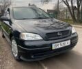 Черный Опель Астра, объемом двигателя 1.36 л и пробегом 135 тыс. км за 3400 $, фото 1 на Automoto.ua