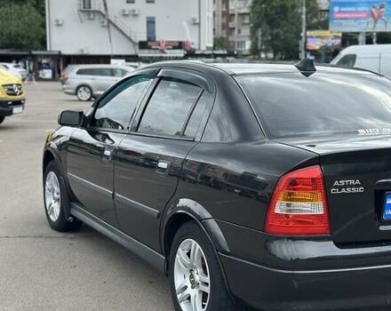 Черный Опель Астра, объемом двигателя 1.4 л и пробегом 277 тыс. км за 3300 $, фото 3 на Automoto.ua